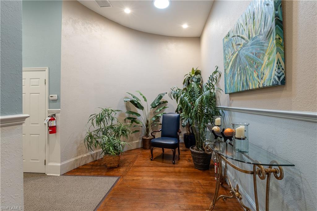 Sitting room featuring wood-type flooring