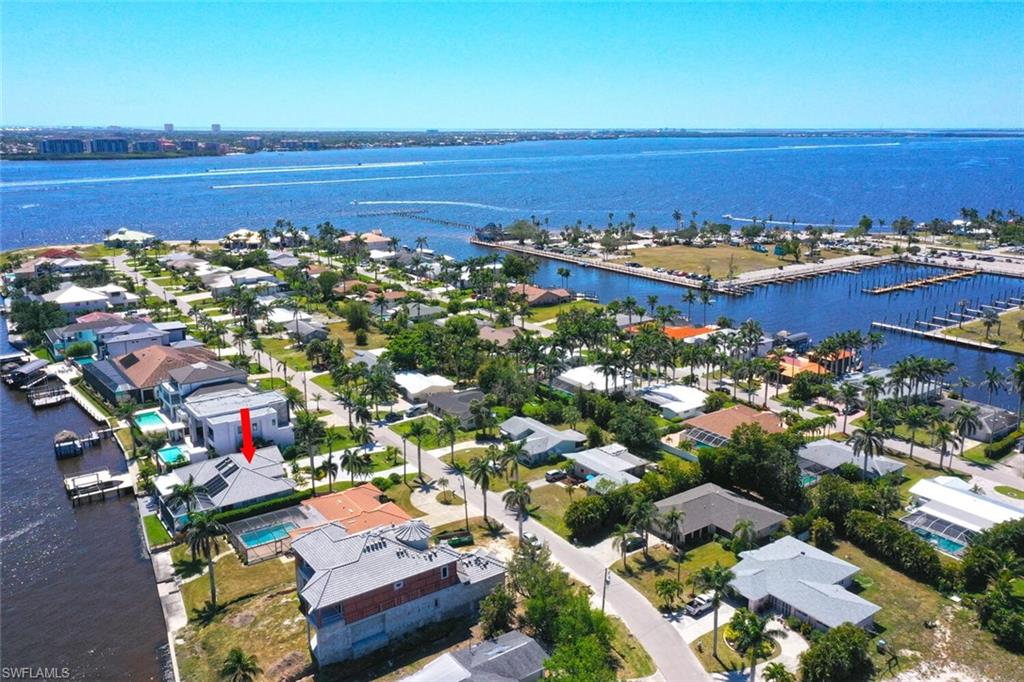 AERIAL OF HOME SHOWING CLOSE PROXIMITY TO THE YACHT CLUB & BEACH