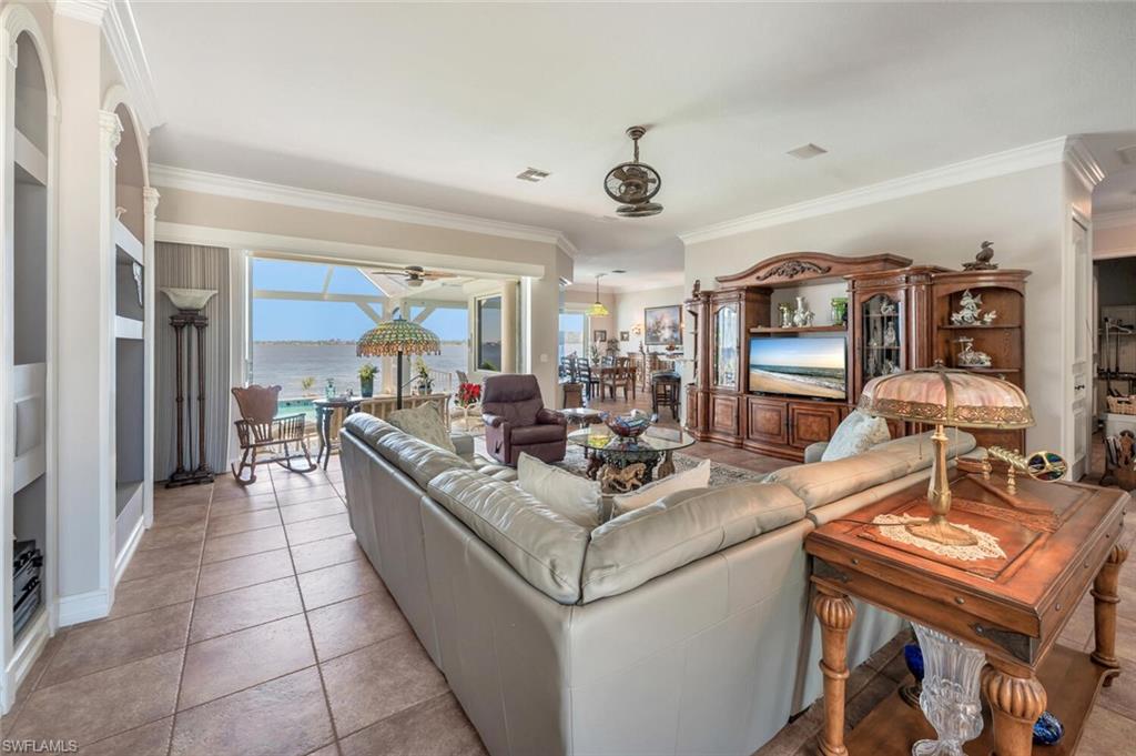 Virtually modified photo-GREAT ROOM FACING LANAI & RIVER