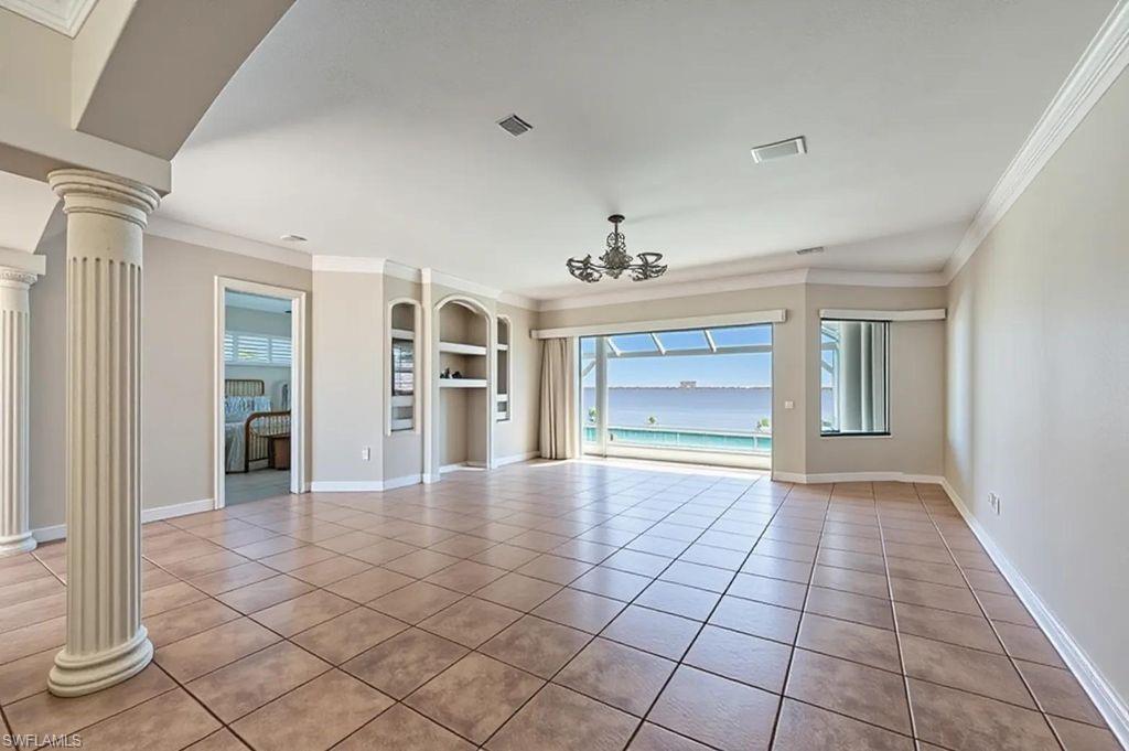 Virtually modified photo-GREAT ROOM FACING LANAI & RIVER