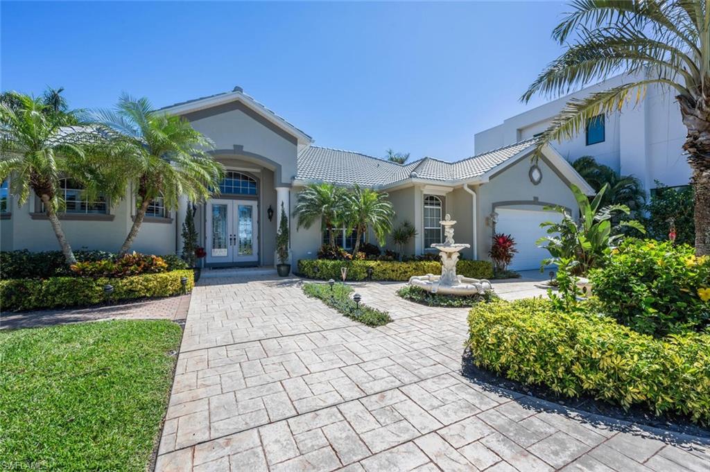 FRONT OF HOME W/OVERSIZED GARAGE