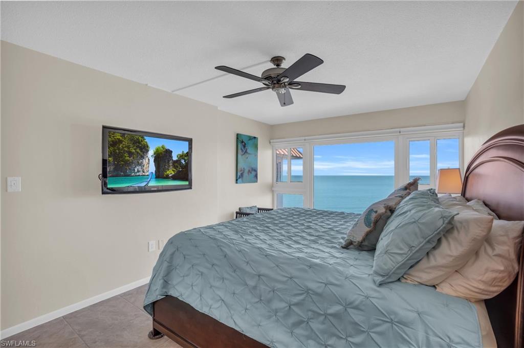 Expansive windows framing direct ocean access