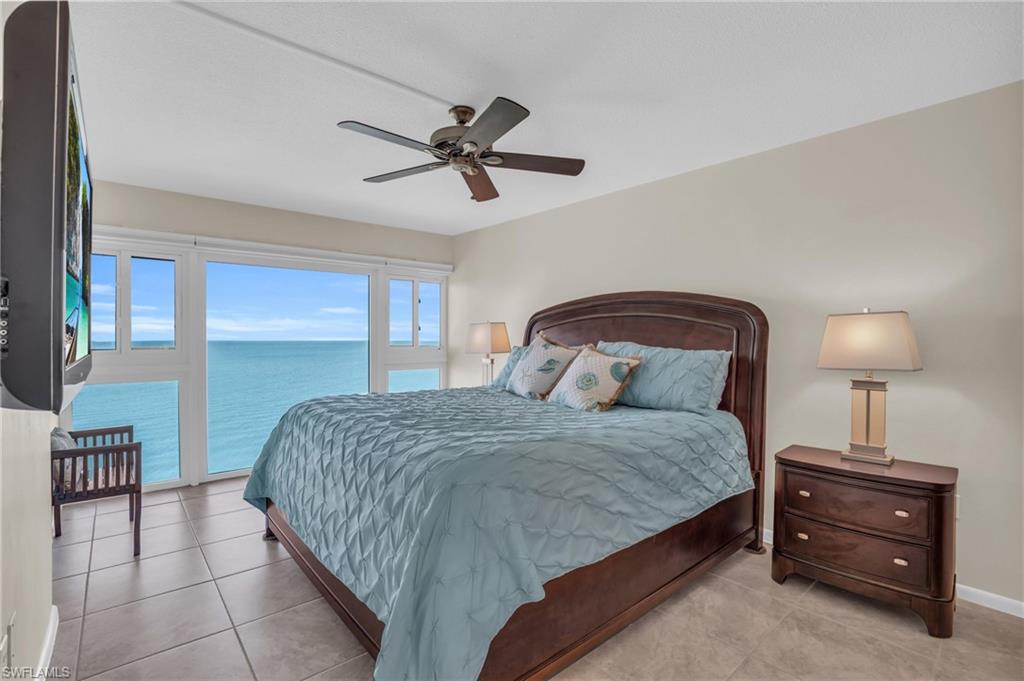 Expansive floor-to-ceiling windows overlooking open water