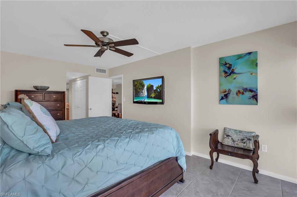 Bedroom featuring neutral wall paint and tile flooring