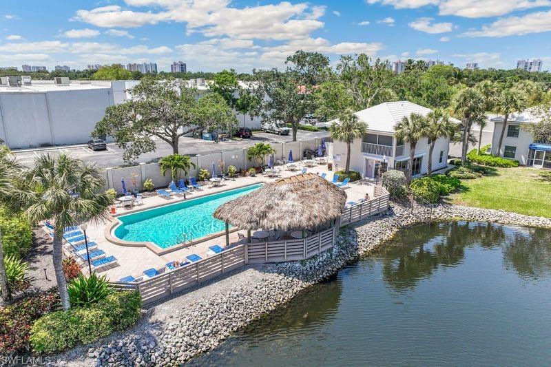 Aerial view of community pool and clubhouse.