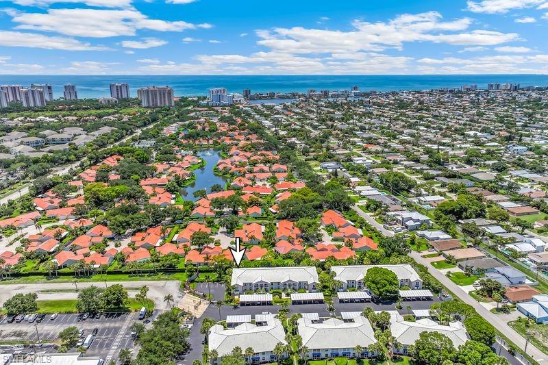 Aerial perspective showcasing the community and location to Vanderbilt Beach.