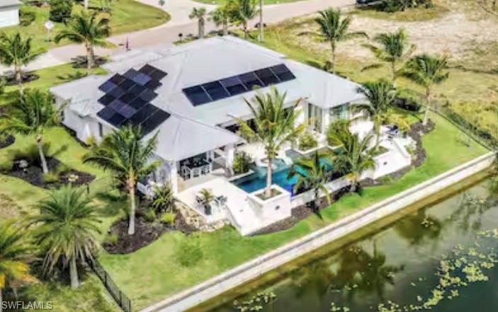 View of subject property with a pool