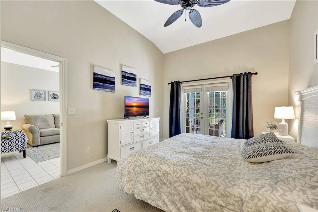 Vaulted ceiling bedroom with outdoor access