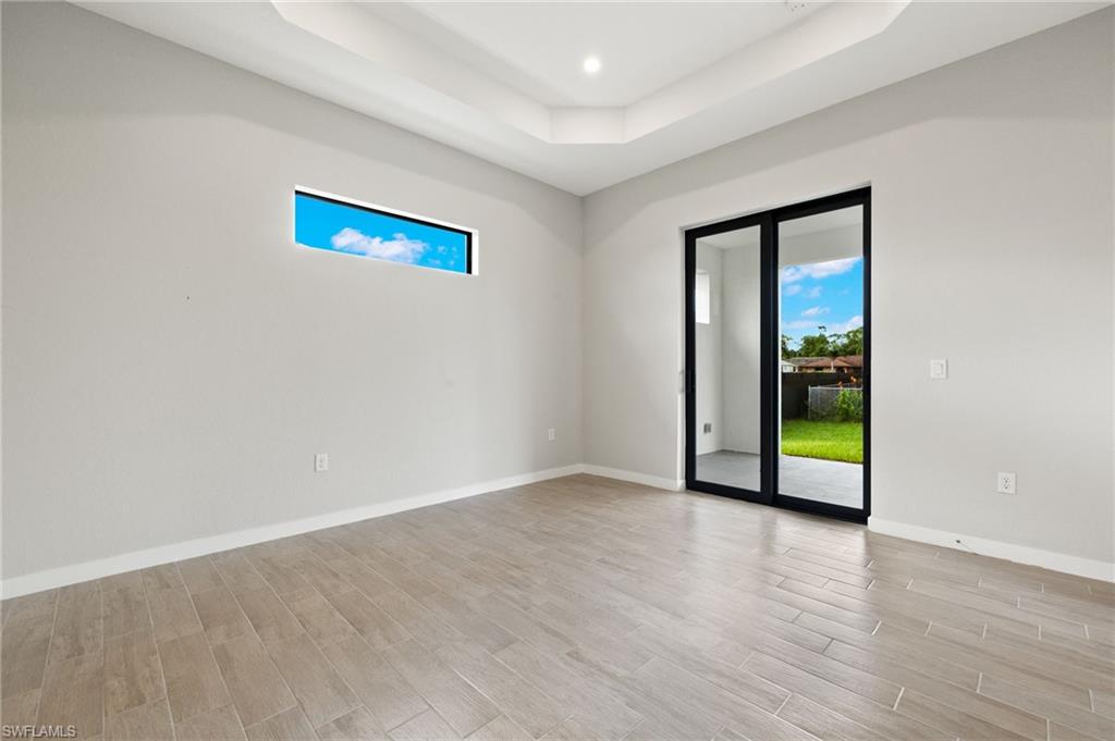 Flooring upgraded to premium, color-matched Luxury Vinyl Plank [LVP].