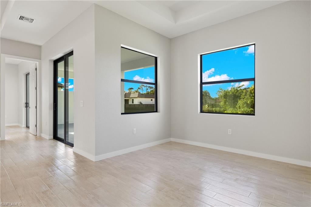 Flooring upgraded to premium, color-matched Luxury Vinyl Plank [LVP].