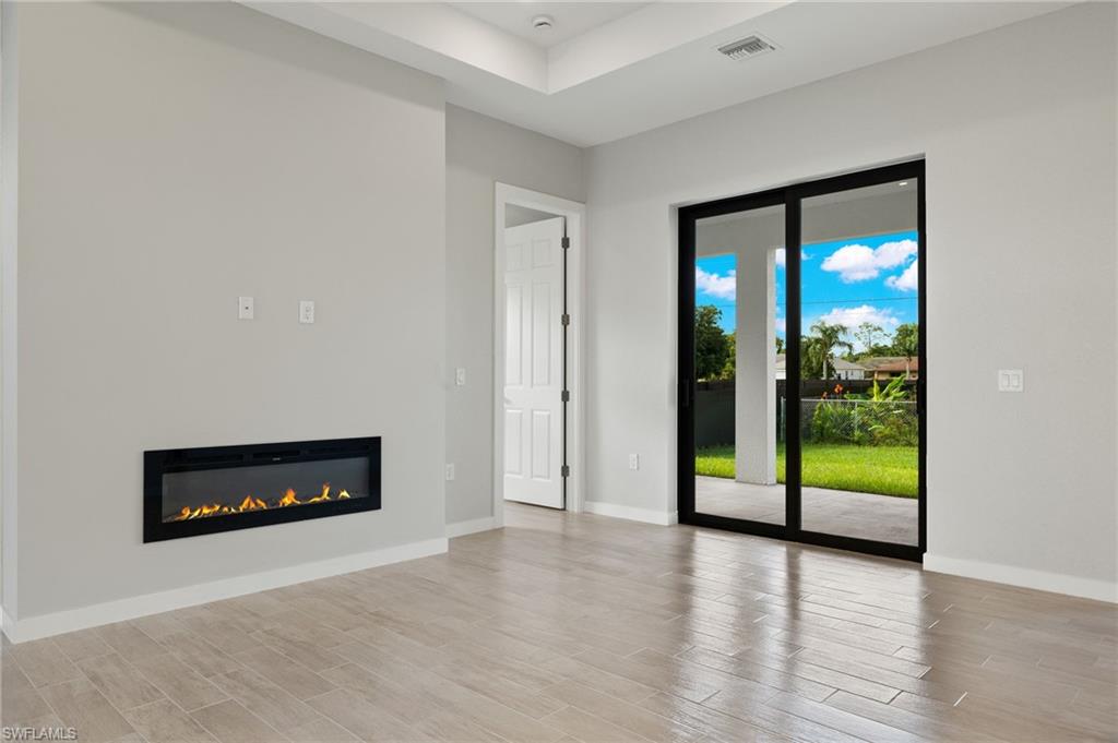 Flooring upgraded to premium, color-matched Luxury Vinyl Plank [LVP].