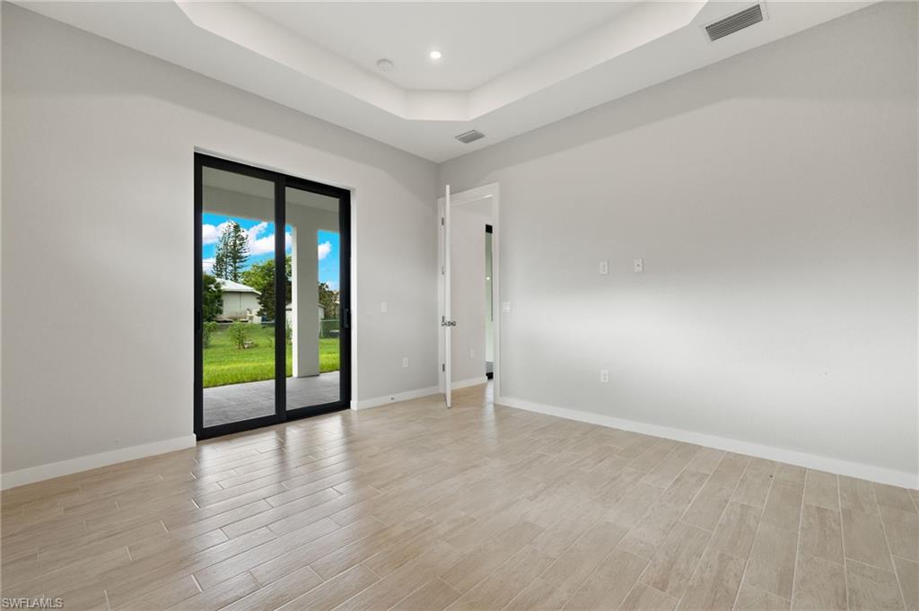 Flooring upgraded to premium, color-matched Luxury Vinyl Plank [LVP].