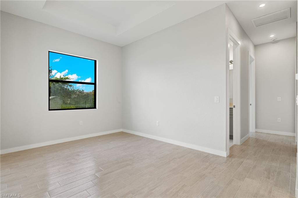 Flooring upgraded to premium, color-matched Luxury Vinyl Plank [LVP].