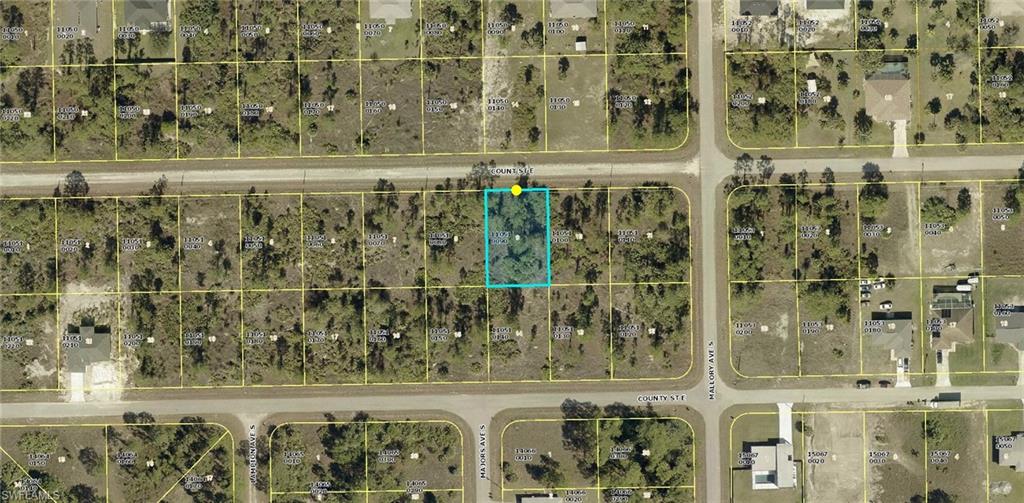 Aerial overview of property's location with property parcel outlined