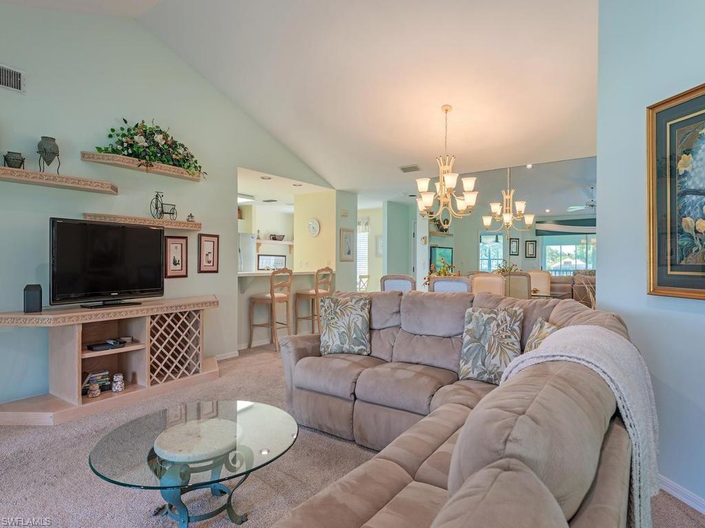 Great room with access to the kitchen and lanai