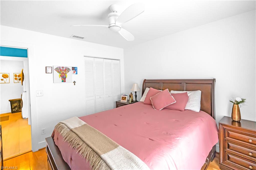 Bedroom featuring wood-finish flooring and a ceiling fan