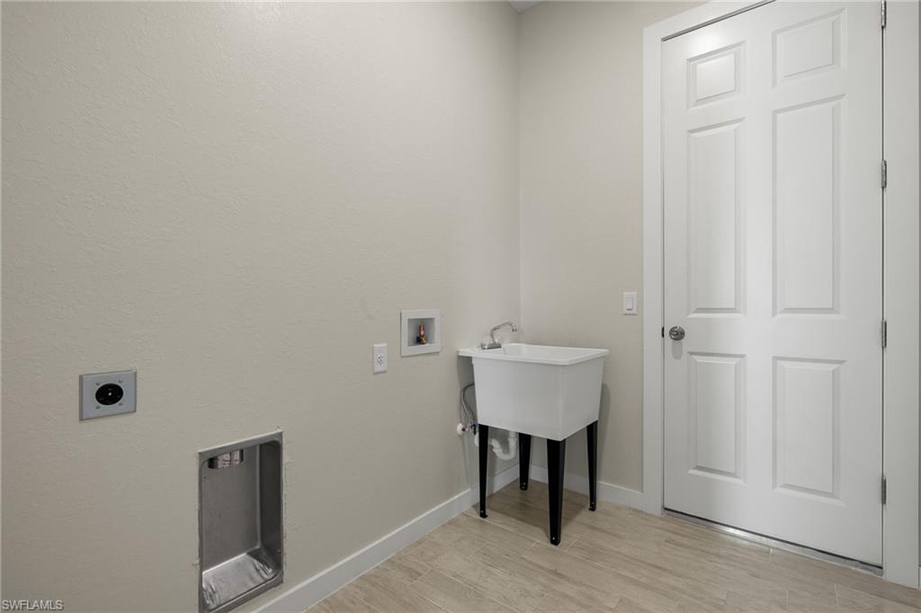 Flooring upgraded to premium, color-matched Luxury Vinyl Plank [LVP].