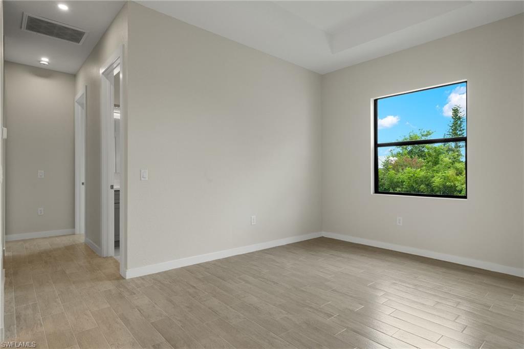 Flooring upgraded to premium, color-matched Luxury Vinyl Plank [LVP].