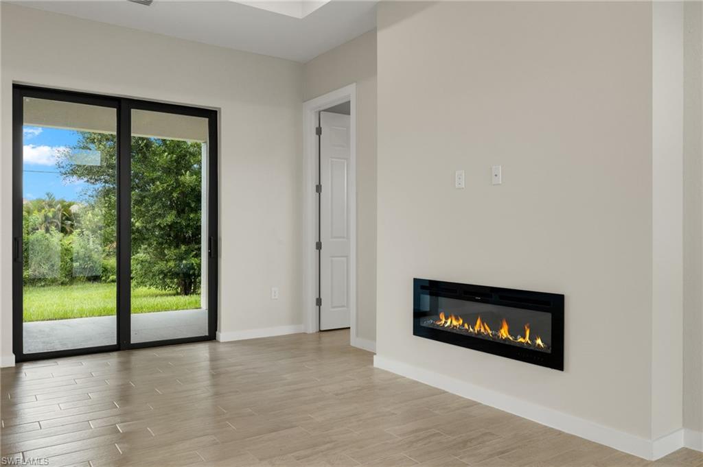 Flooring upgraded to premium, color-matched Luxury Vinyl Plank [LVP].