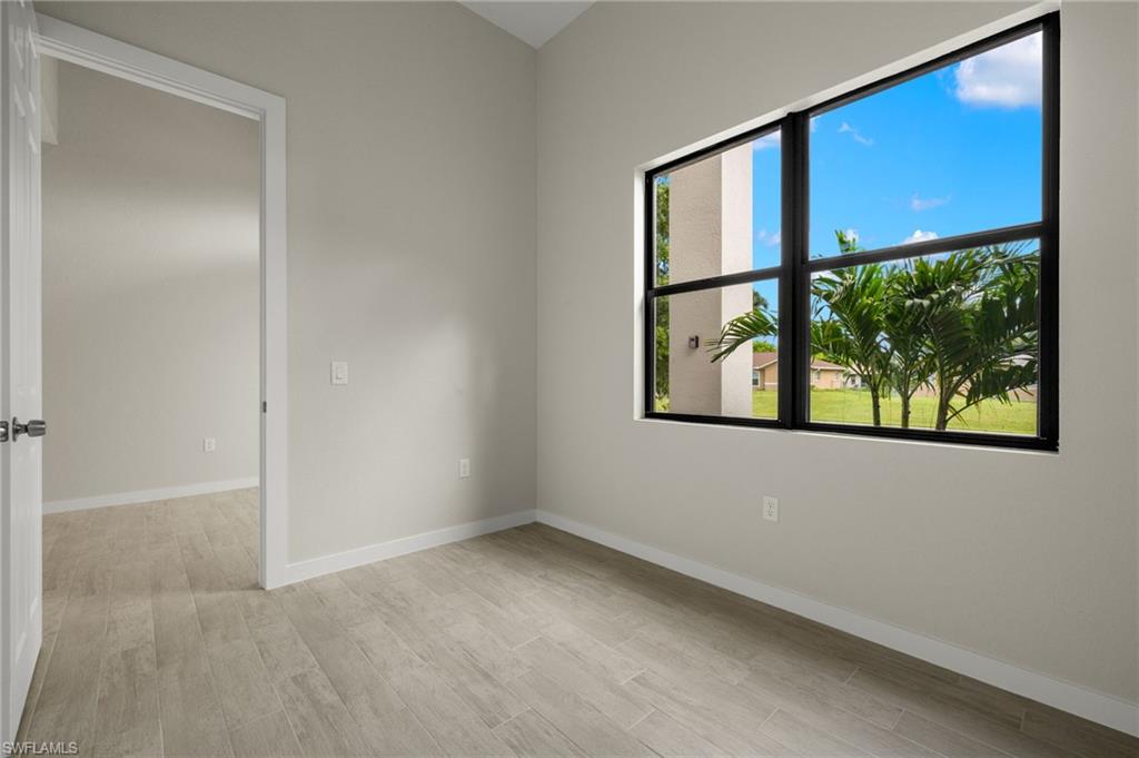 Flooring upgraded to premium, color-matched Luxury Vinyl Plank [LVP].