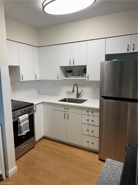 Updated cabinetry, quartz countertops and backsplash, stainless steel appliances