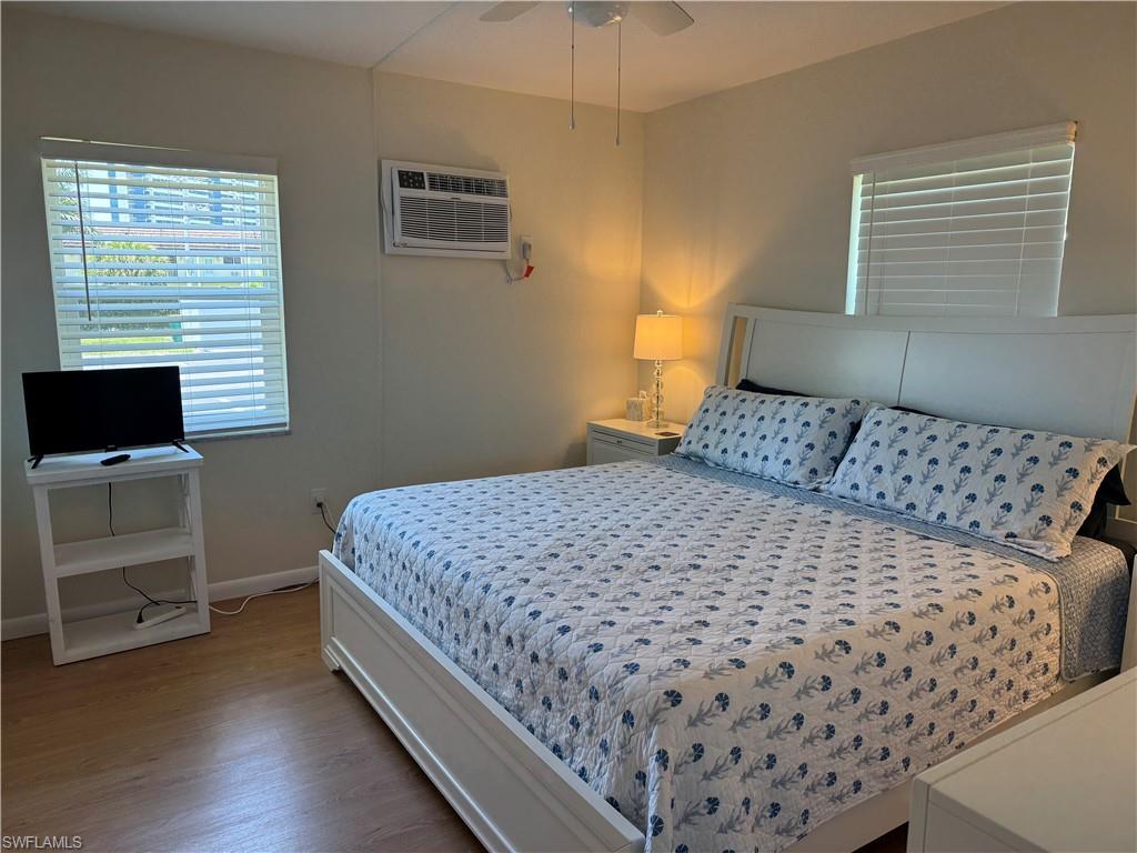 Spacious primary bedroom with king size bed and brand new furniture