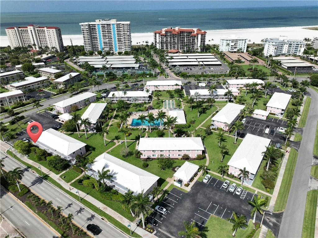 Walk to white sand beach of Marco Island