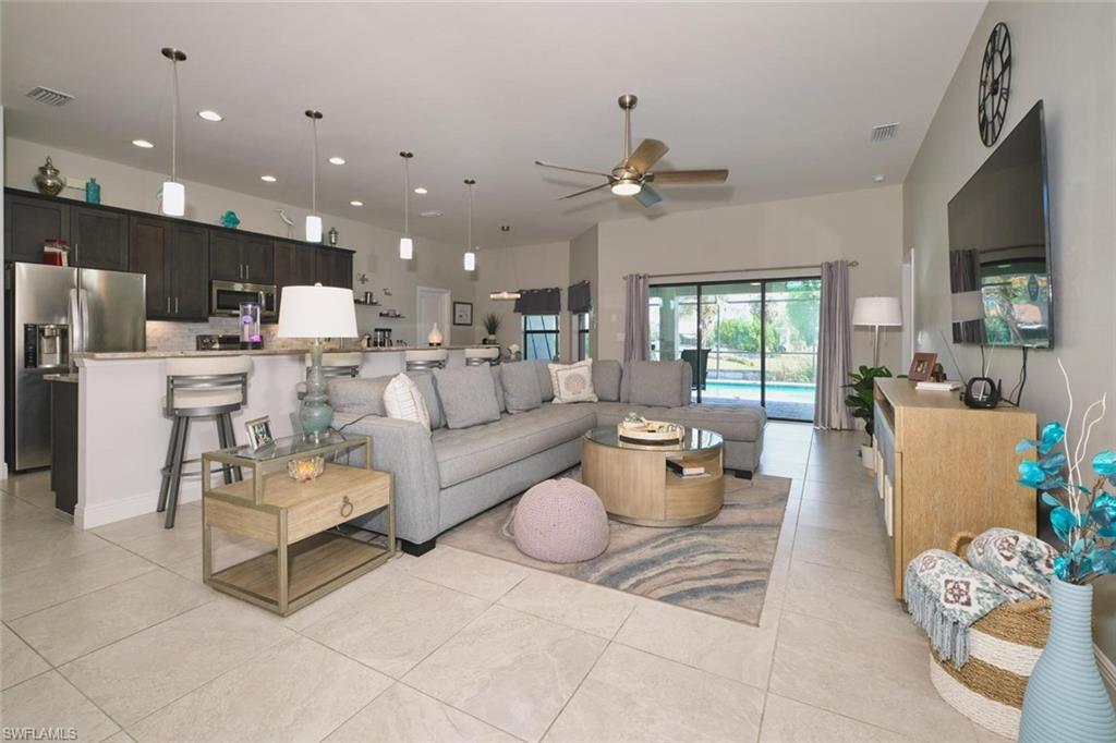 Open floor plan with  TILE  flooring throughout