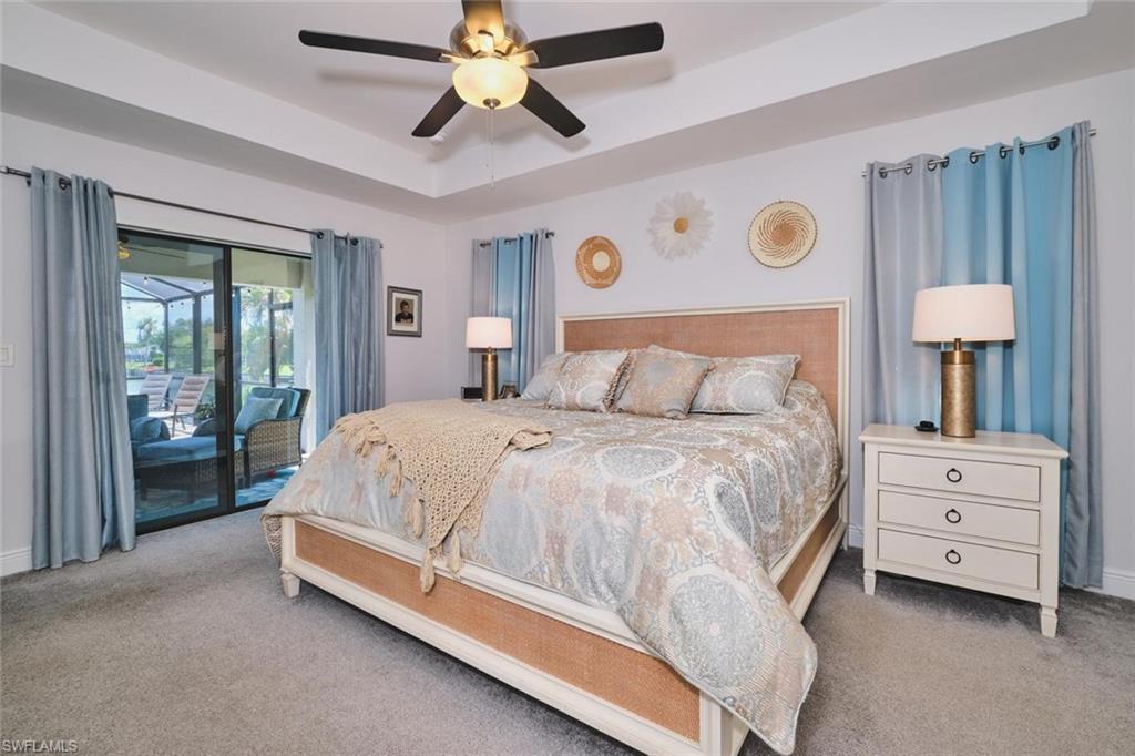 Neutral carpeting and tray ceiling