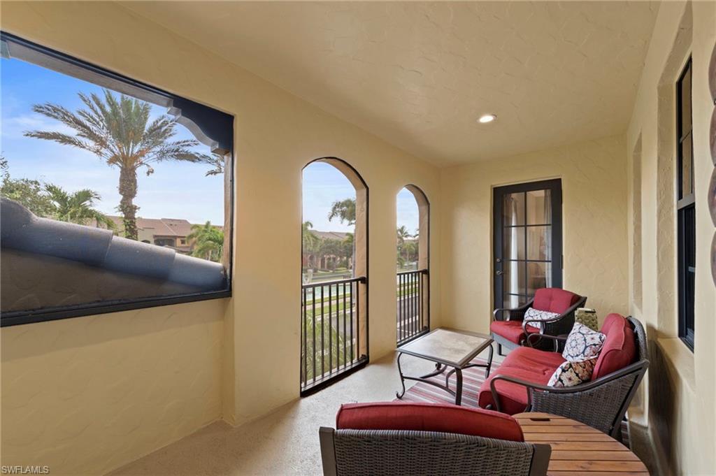Large screened lanai overlooking the water feature boulevard. NEW NO-SEE-UM SCREEN (2025)