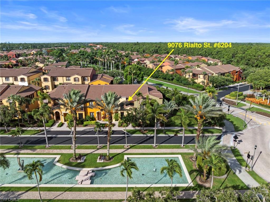 The condo is located on a beautiful water feature boulevard. Mediterranean-style architecture with stucco exterior and tile roofing.NEW ROOF (2024)