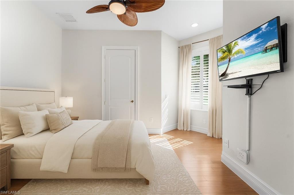 The second bedroom offers a private ensuite full bath and a beautifully appointed sitting area, gracefully bathed in abundant natural light for an inviting and serene ambiance. 2nd bedroom is Virtually Staged