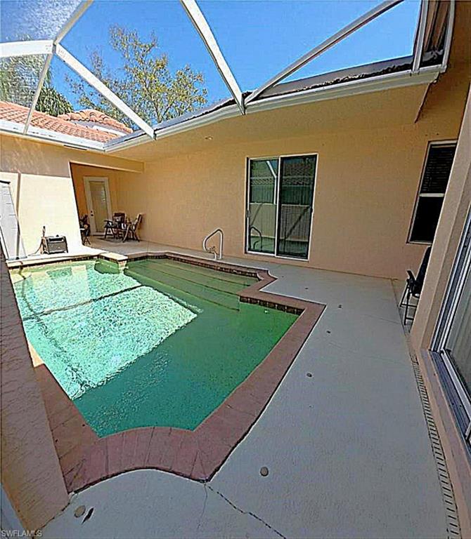 POOL VIEW FRON SCREEN DOOR BY MASTER BEDROOM