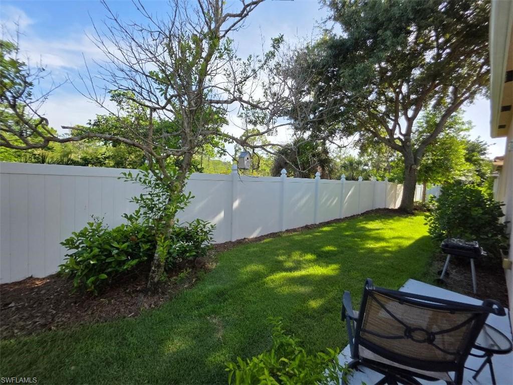 REAR YARD VIEW TO PRESERVE BEHIND FENCE