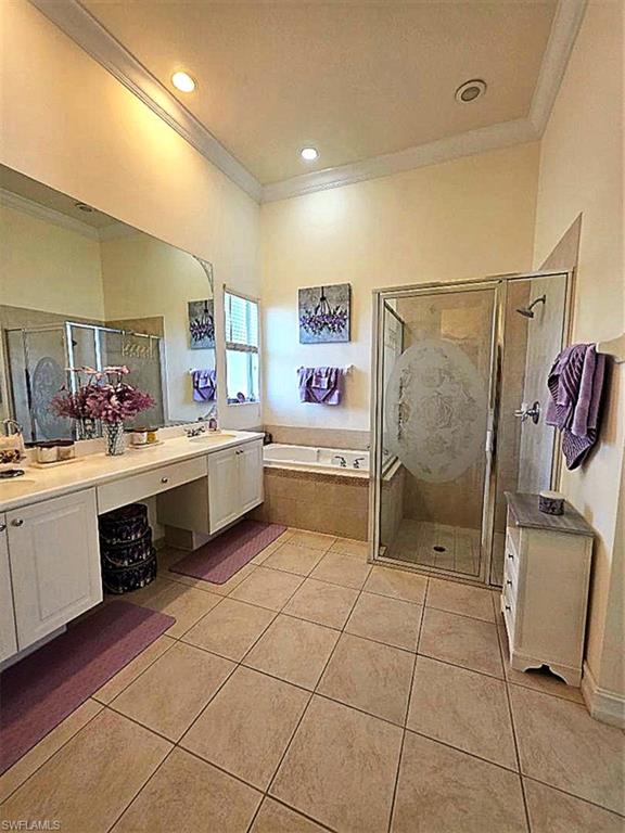 MASTER BATHROOM VIEW FROM WALK IN CLOSET TO TUB