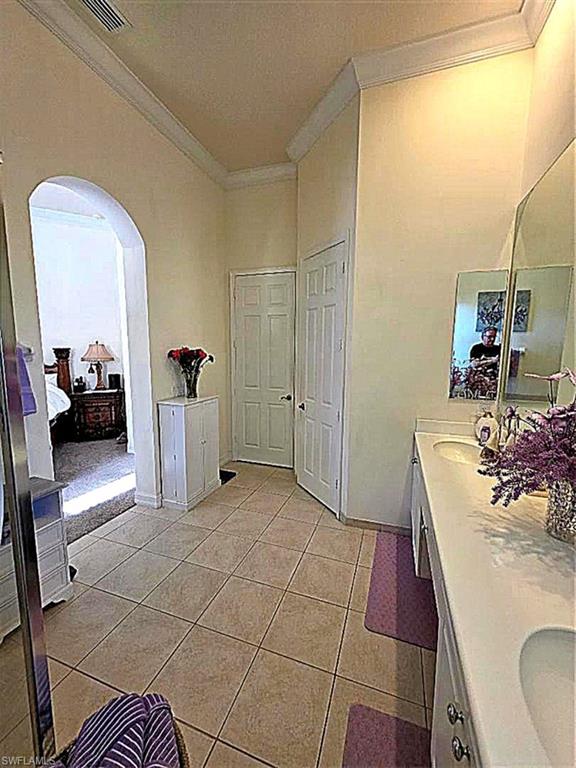VIEW 2 OF MASTER BATH FROM TUB TO WALK IN CLOSET