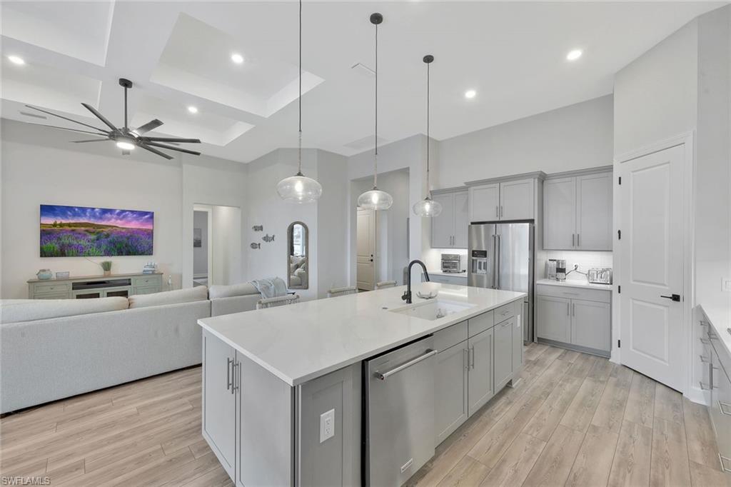 upgraded large kitchen island with quartz countertops