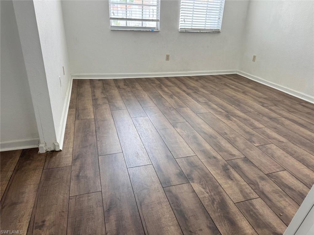 Wood-finish flooring throughout the space