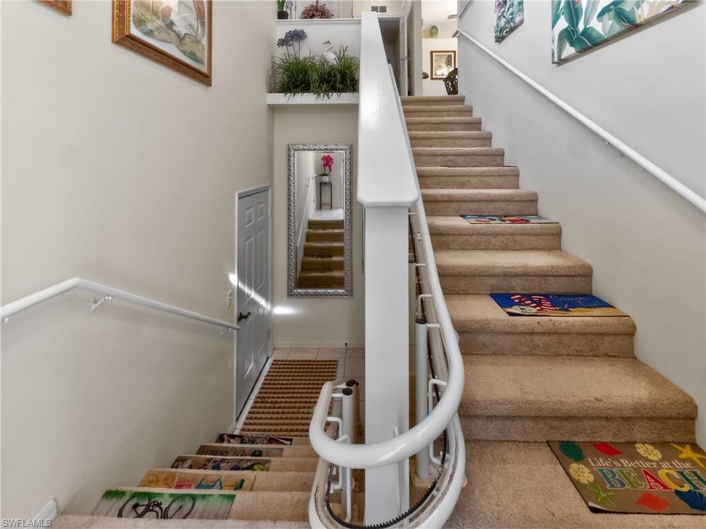 Foyer to front entrance and Garage door entrance with electric stair chair lift.