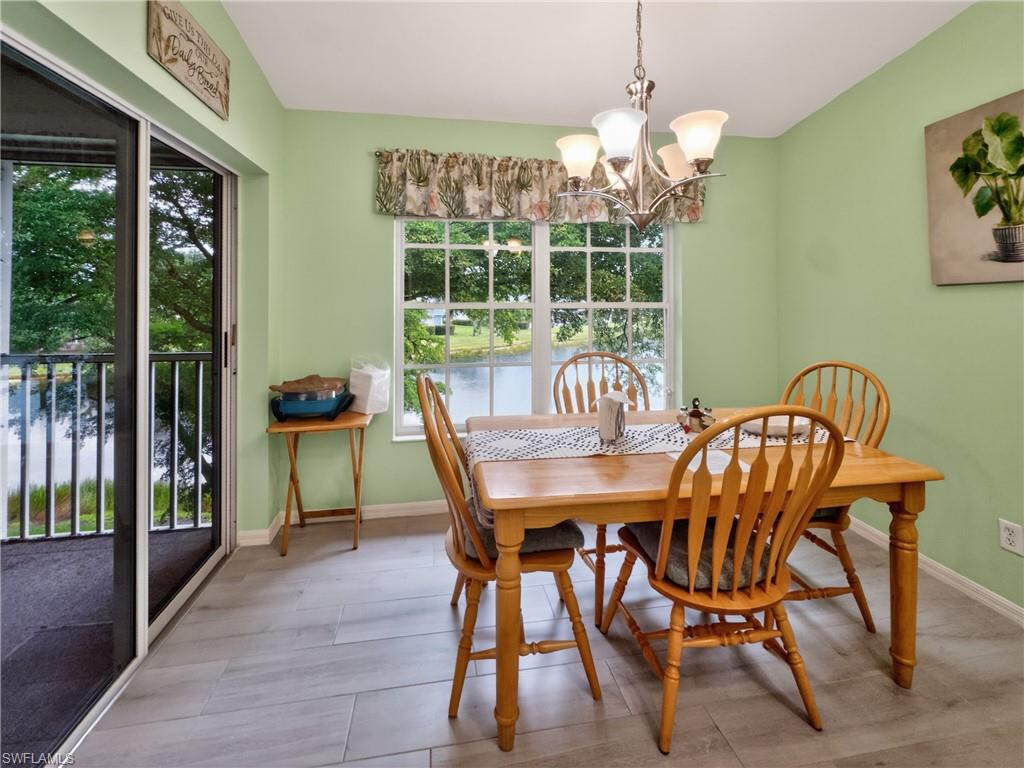 Eat in kitchen area with lake views.  Slider to screened lanai