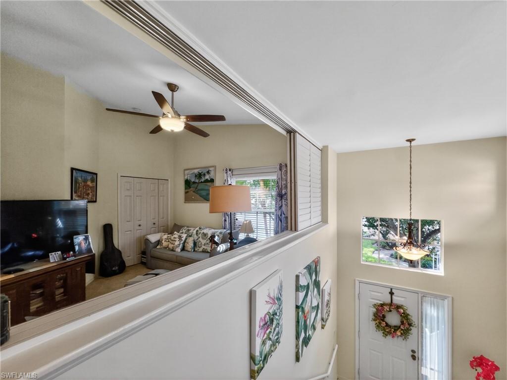 View of sliding shutters allowing more natural light to Den/Bedroom. 3rd Bedroom currently used as a Den.