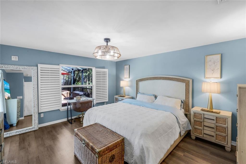 Primary ensuite bedroom opens to pool