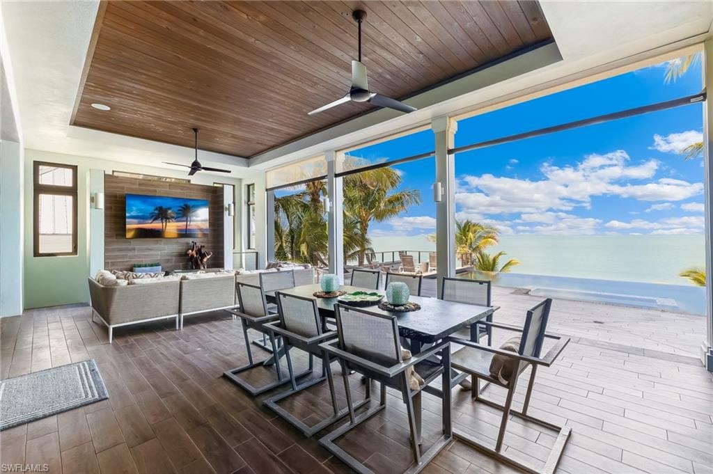 Spacious outdoor lanai with seating, outdoor dining