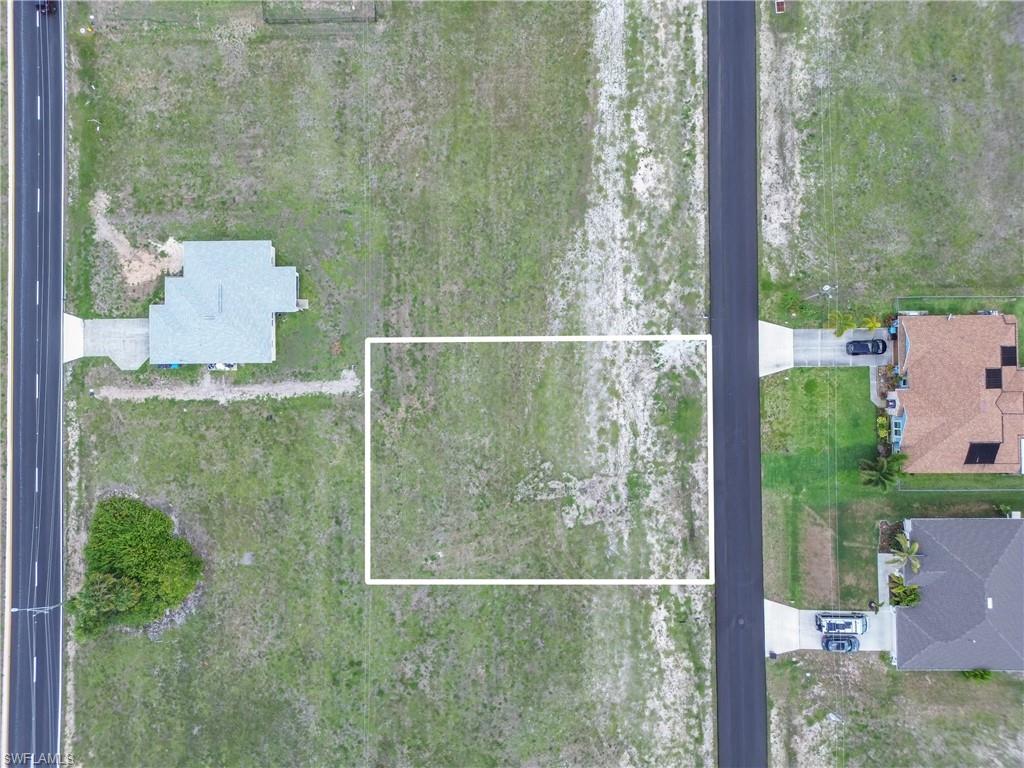 Vacant lot with direct road frontage, surrounded by existing residential properties