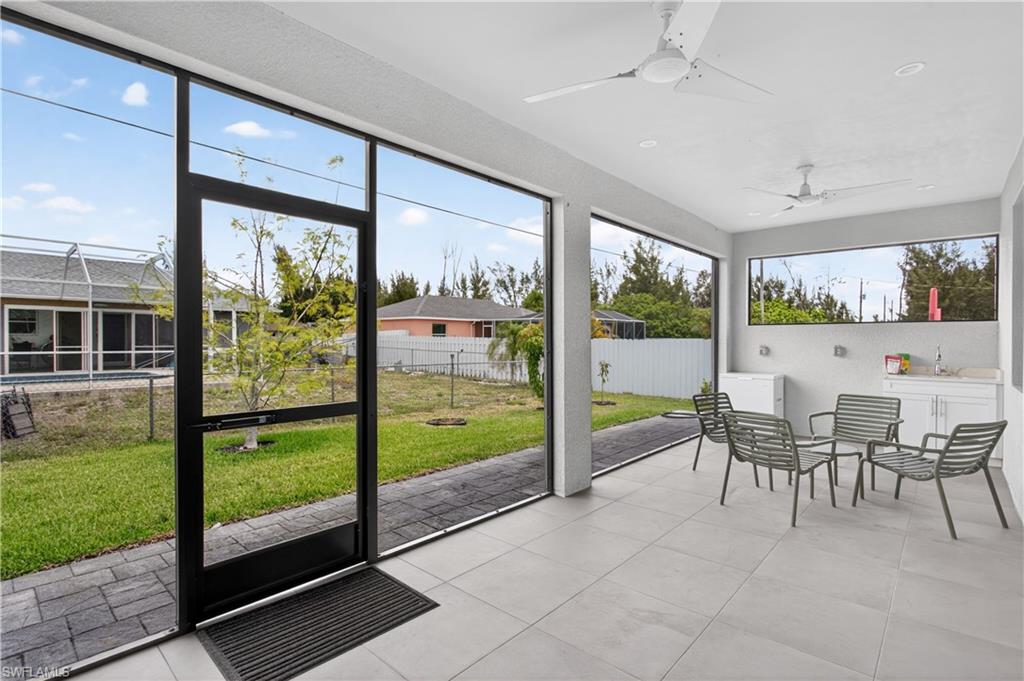 Enjoy the best of OUTDOOR FLORIDA LIVING from the LARGE SCREENED LANAI complete with multiple ceiling fans, ample covered seating area and OUTDOOR KITCHEN/SINK space perfect for BBQs, relaxing evenings or enjoying SWFL’s year-round sunshine.
