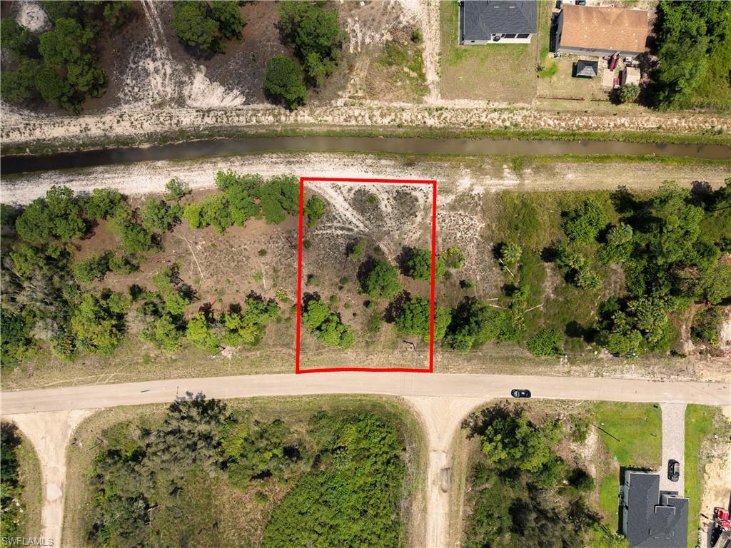 Vacant land parcel featuring a natural landscape with mixed vegetation