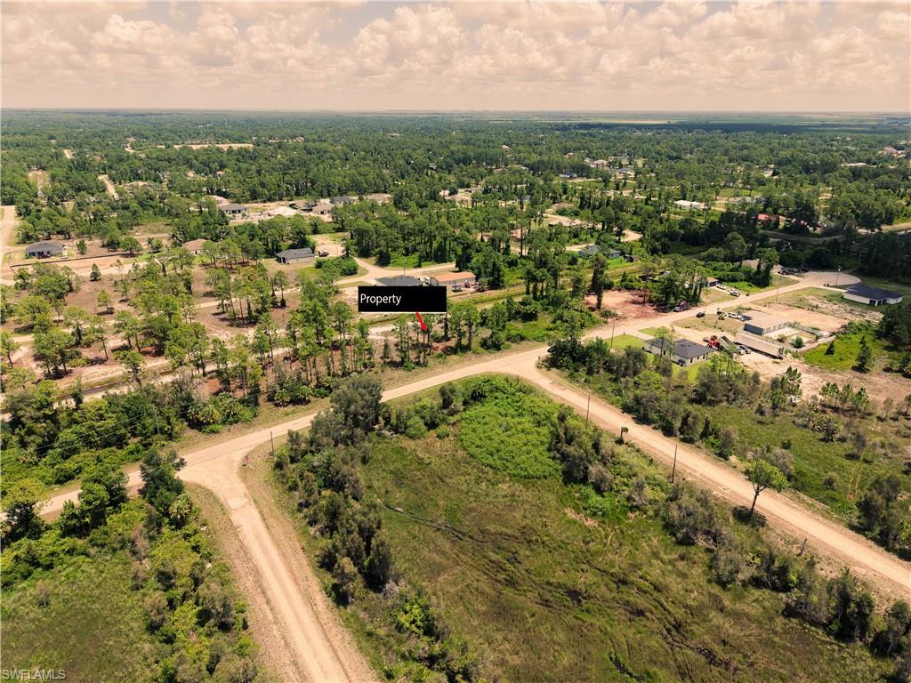 Expansive land parcel featuring a predominantly wooded landscape