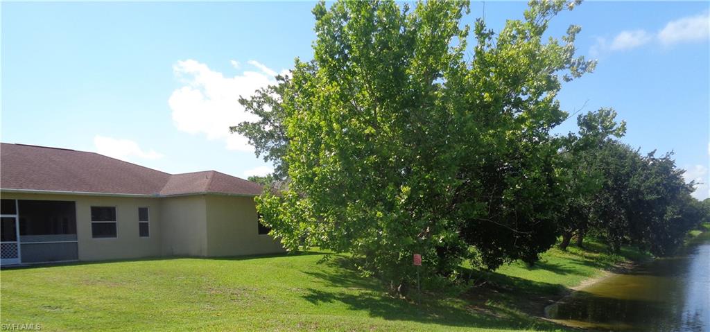 Wide view of the back of the property