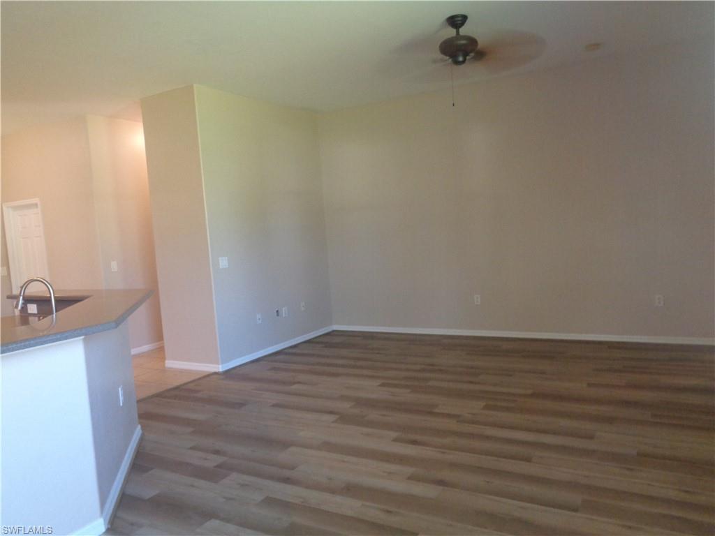 View of the Family Room featuring wood-style flooring and ceiling fan
