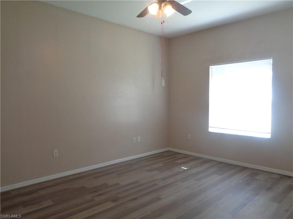 View of the Master Bedroom with wood-like flooring and ceiling fan